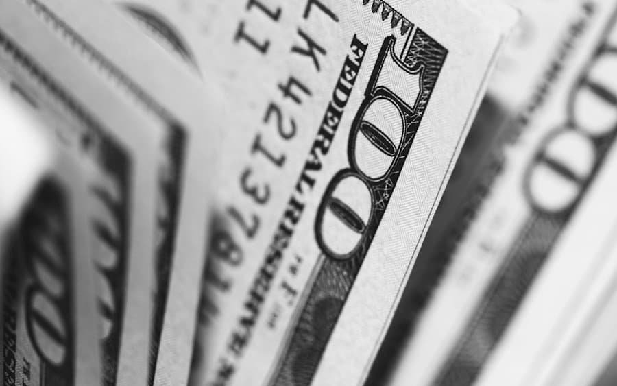 Black and white photo of a stack of us dollar bills.